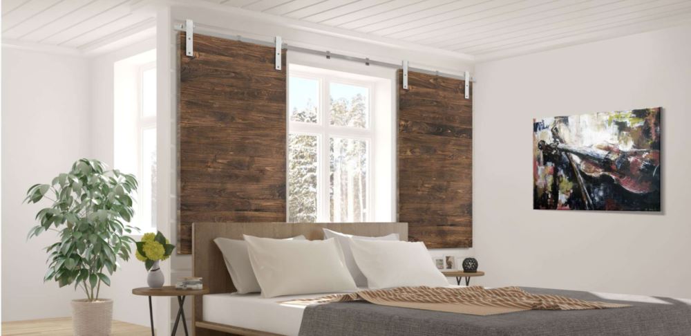 Barn door shutters in a bedroom