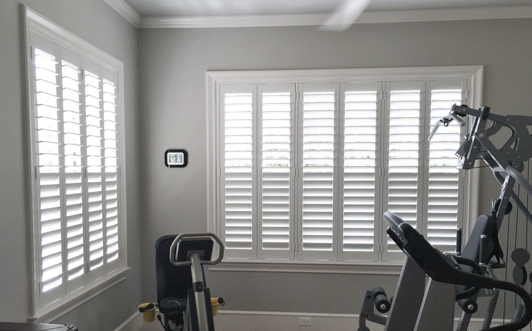 Cincinnati exercise room with shuttered windows.